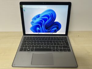 Dell Latitude 7210 2-in-1 laptop, shown with the screen detached from the keyboard, highlighting its tablet form.